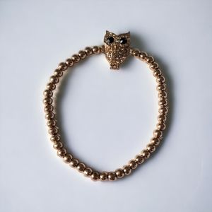 PRELOVED • gold beaded rhinestone owl bracelet